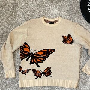 PacSun Cream Knit Sweater with Orange Butterfly Design
